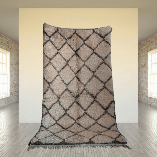 Soft neutral Beni Ourain runner featuring diamond patterns, showcasing Moroccan craftsmanship in a bright room setting.